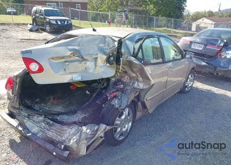 2005 Toyota Corolla Le z USA, uszkodzony, nr VIN 2T1BR30E75C456912